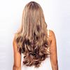 Premium Hair Kundenfoto: Junge Frau mit Echthaarextensions